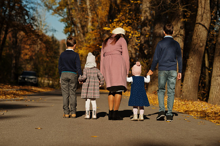 Back of mother with four kids on autumn park., a Person Photo by AS photostudio