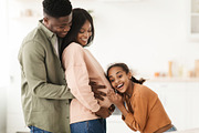 Happy Black Family Hugging Expecting Baby In Kitchen At Home, a Photo by Prostock-Studio (Thumbnail 3 of 5)