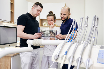 Dentists Reviewing a Dental X-Ray
