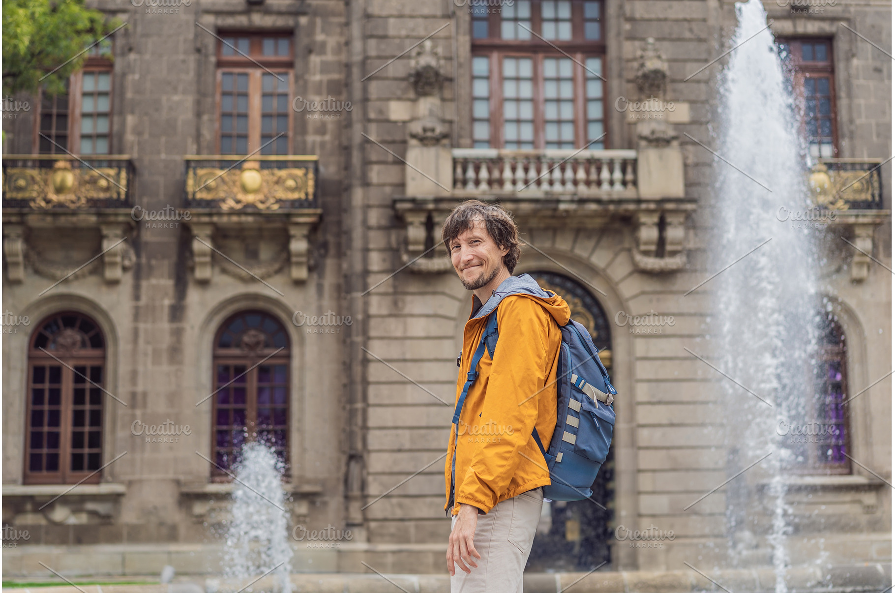 Male tourist standing near, an Architecture Photo by Elizaveta Galitskaya