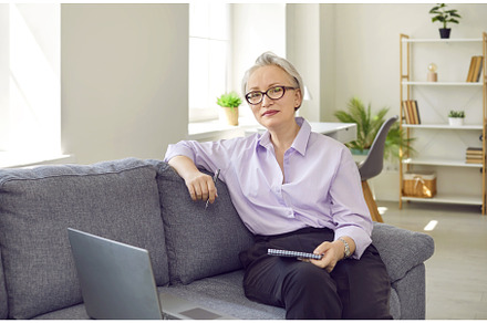 Elegant middle aged business lady, a Person Photo by StudioRomantic
