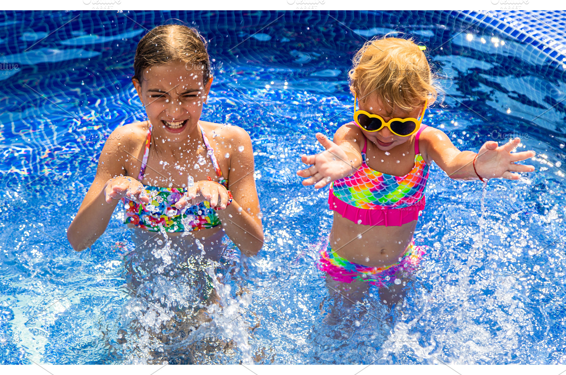 Child near the pool in sunglasses, a Sports & Recreation Photo by yanadjana
