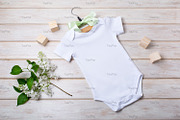 Baby onesie mockup with white lilac., a Shirt Mockup by TasiPas (Thumbnail 3 of 4)