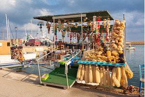 Souvenir stall in Chania harbor, a Transportation Photo by kavalenkava