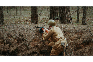 Soldier Aiming in a Forest During, a Person Photo by Our Amazing World