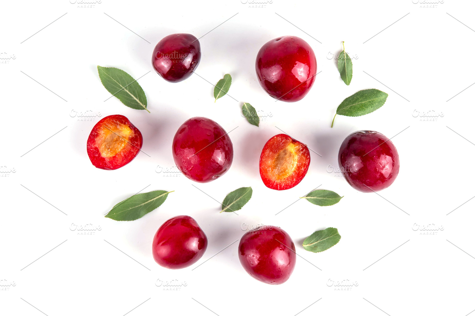 Fresh raw ripe cherry plum with leaves, a Food & Drink Photo by Rimma