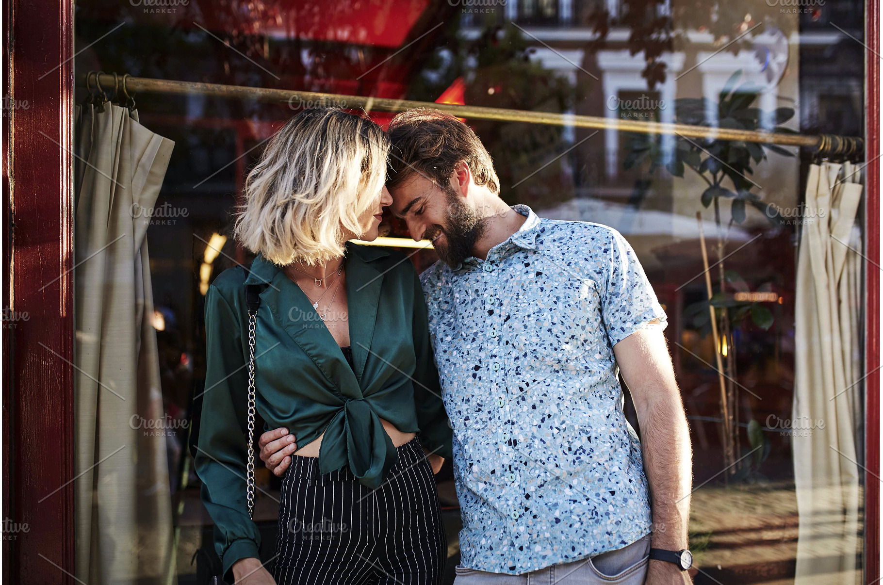 Caucasian couple on streets hugging., a Person Photo by nunezimage