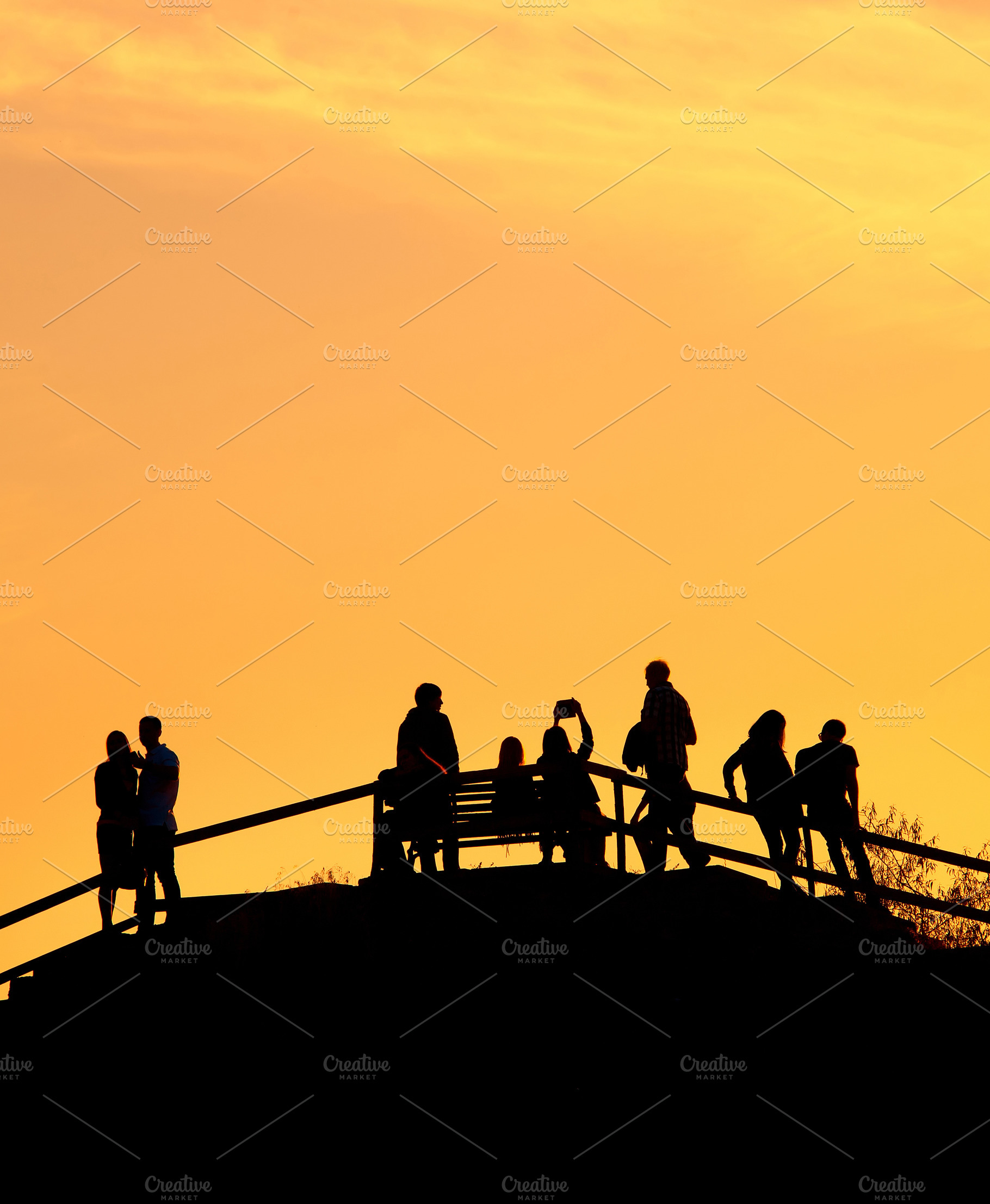 Silhouettes group people sunset park featuring people, city, and background, a Person Photo by joyt
