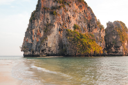 Railay Beach with rocky mountains in the evening, a Nature Photo by Art Rachen