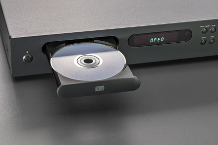 Disc on an open CD player tray.