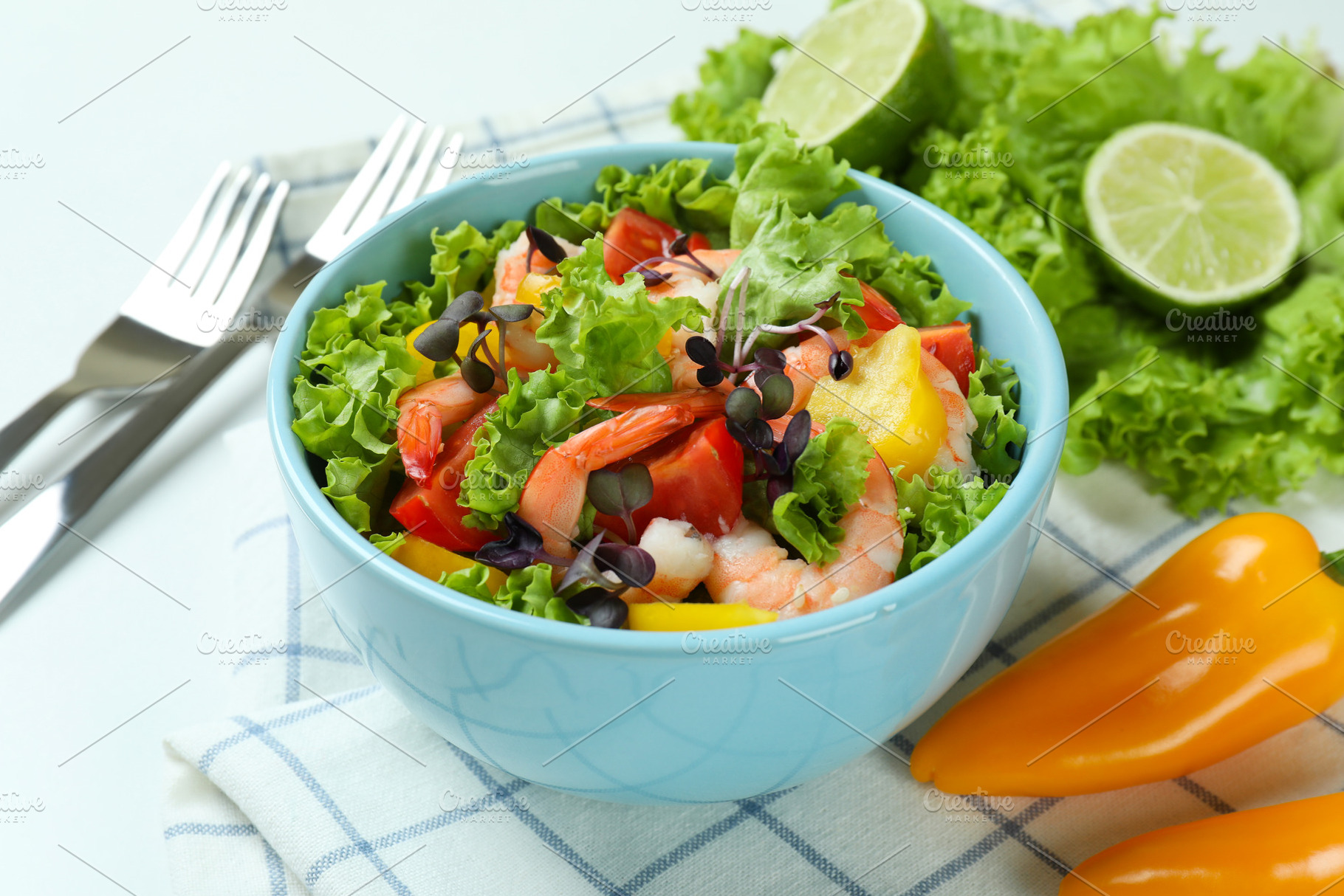Concept of tasty eating with shrimp salad on white background, a Food & Drink Photo by AtlasStudio PRO