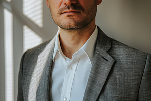 Businessman in gray suit close-up, a Business Photo by AlyaAnd