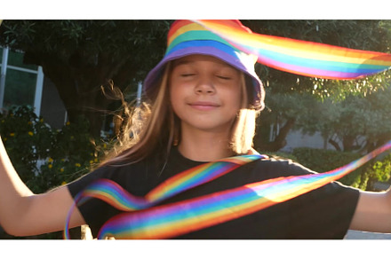 A colorful video shows young girls