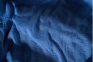 A piece of fabric lies on a surface, a Background Photo by darksoul72