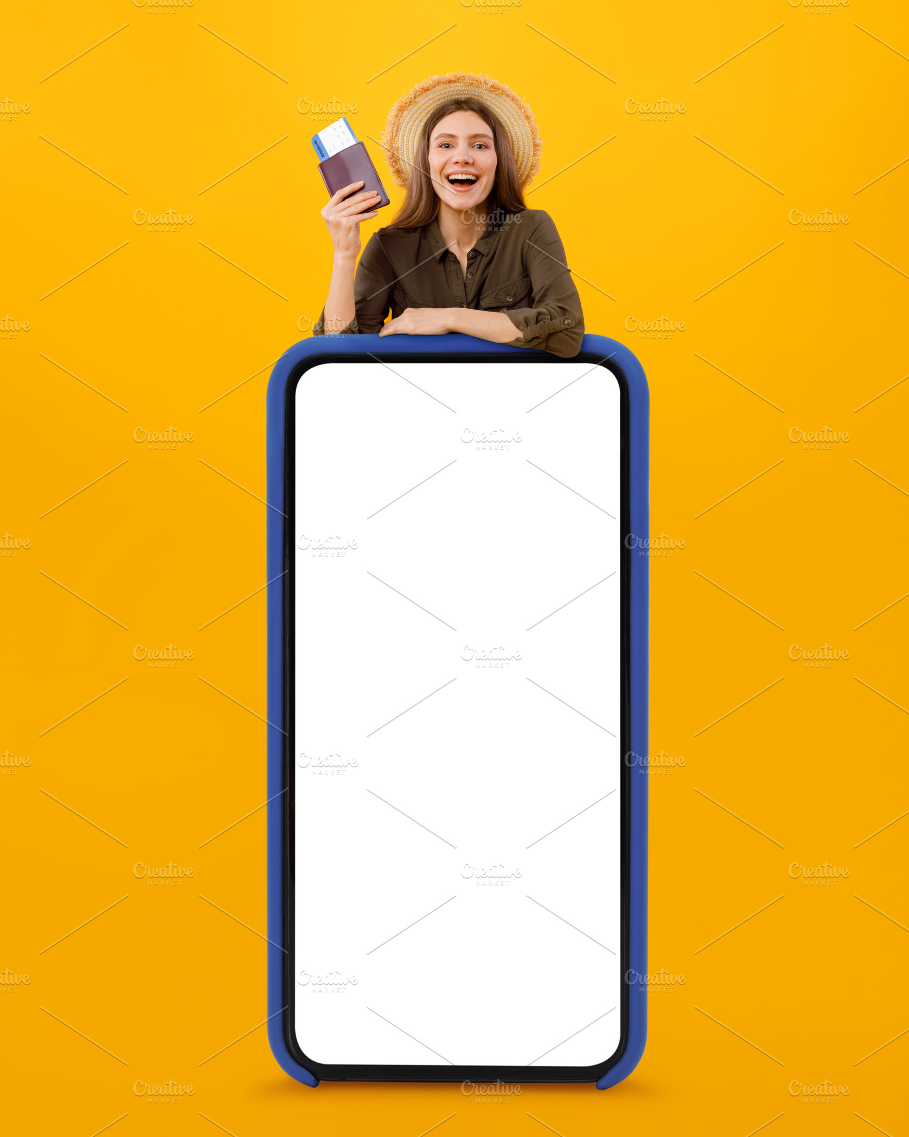 Joyful Female Tourist Posing Ner Huge Smartphone Screen, Yellow Background, a Photo by Prostock-Studio