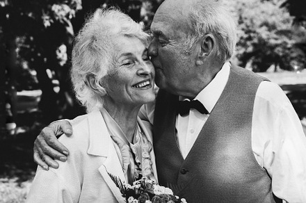 Grandma and grandpa kissing featuring age, aged, and anniversary