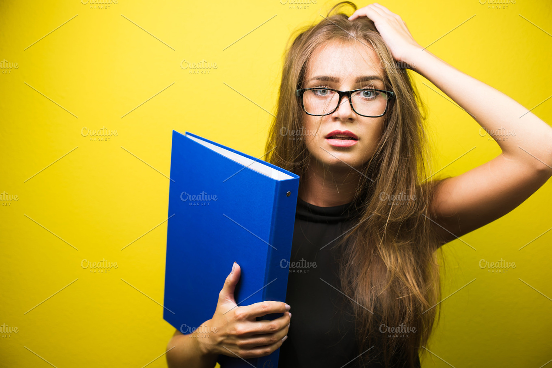 Portrait of a stressed woman stock photo containing business and stress, a Business Photo by BodiaPhoto