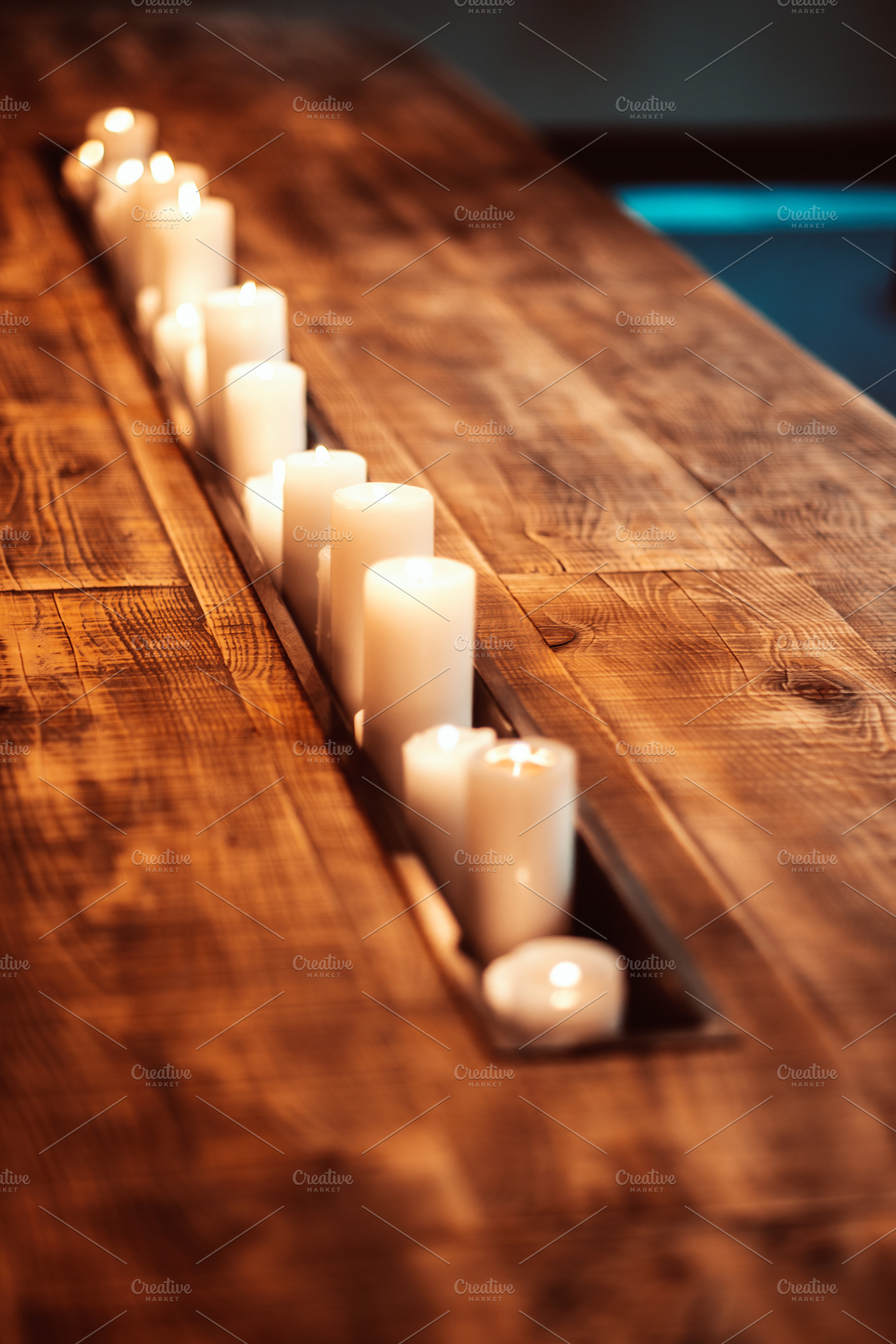 Candles in Recessed Wooden Table, a Sports & Recreation Photo by SkyNext