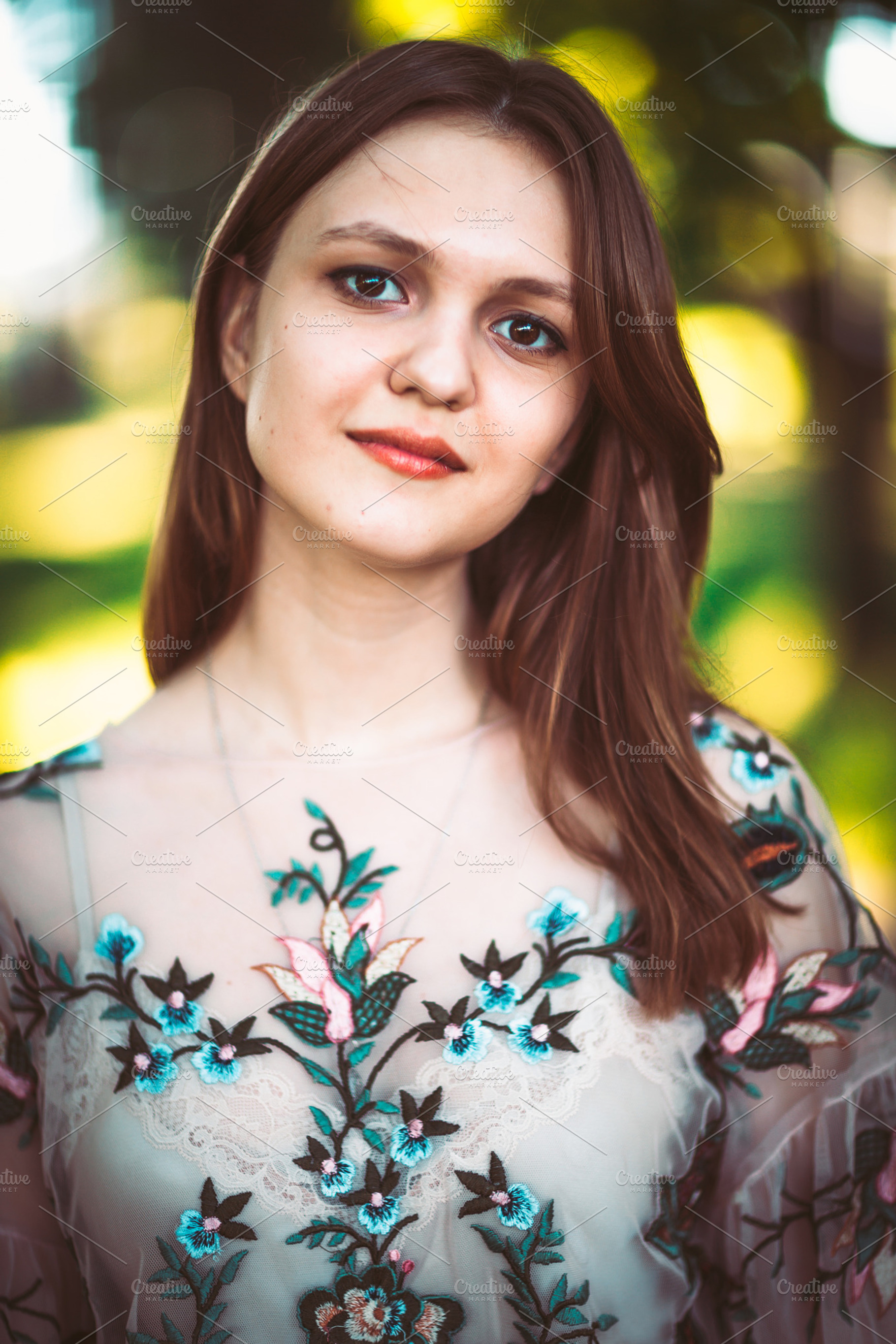 Beautiful young girl on a nature background stock photo containing girl and, a Person Photo by ruslan117