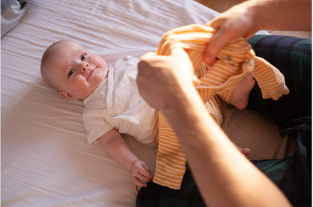 Caucasian parent changing and, a Person Photo by Koldunova