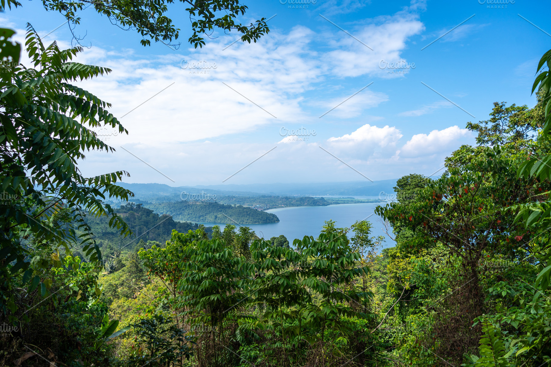 Panoramic view of Lake Poso in Tentena, Sulawesi, Indonesia, a Nature Photo by GoodGoods