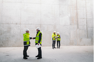 Engineer shaking hand with, a Person Photo by HalfPoint