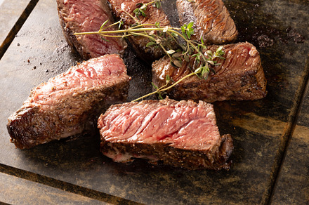 Close up of juicy grilled steaks
