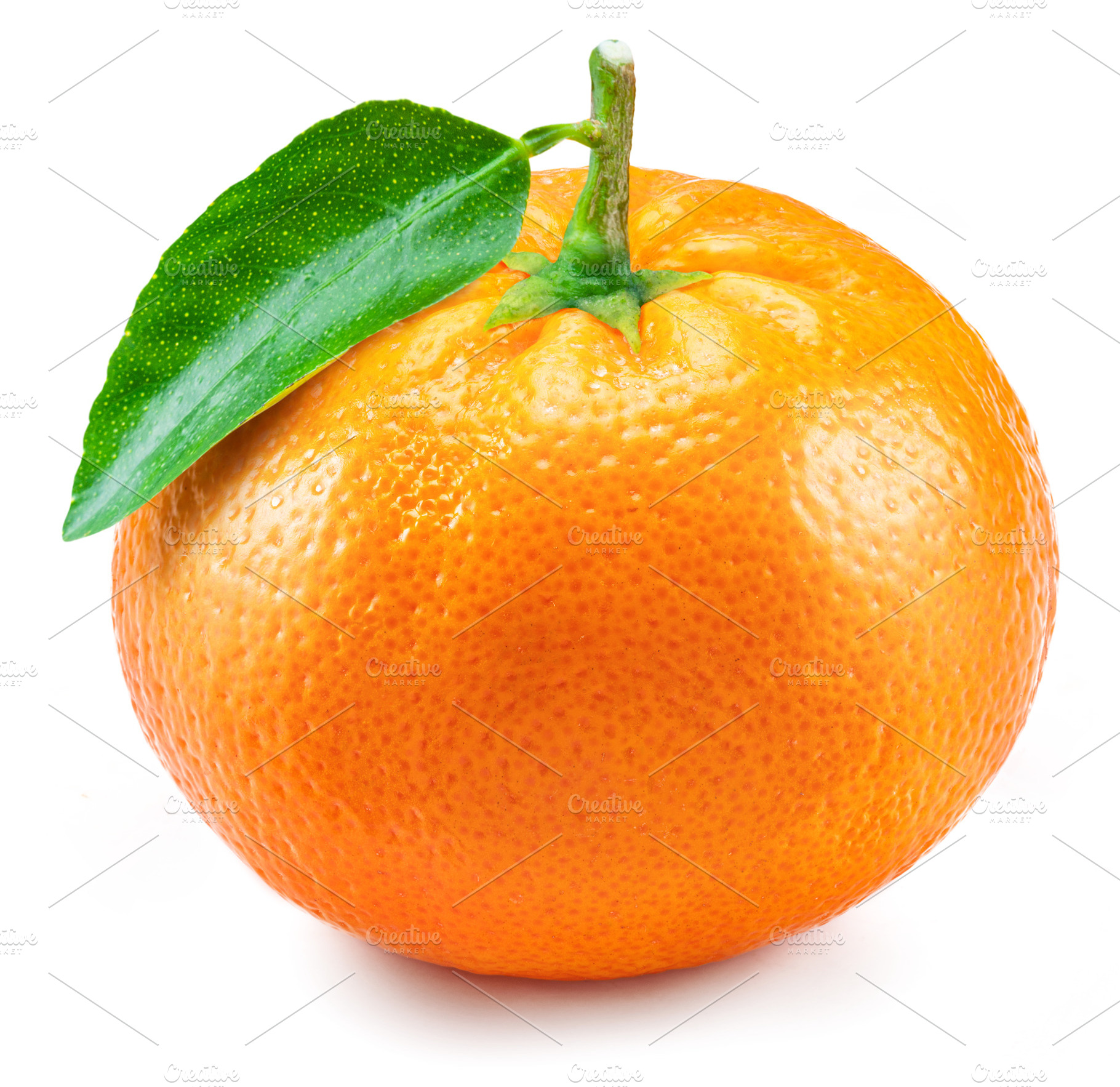 Ripe tangerine fruit with green leaf isolated on a white backgro, a Food & Drink Photo by Volff