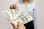 Corruption and bribery concept. Lady giving money to businesswoman over light g, a Photo by Prostock-Studio (Thumbnail 2 of 2)