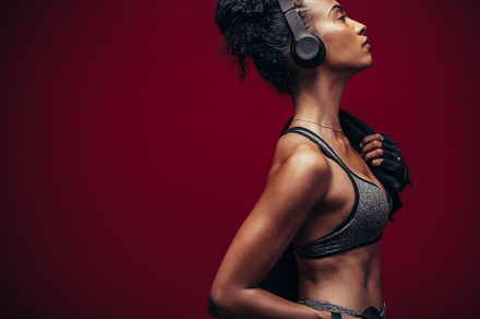 Fitness woman in sportswear featuring african, athlete, and background, a Sports & Recreation Photo by Jacob Lund