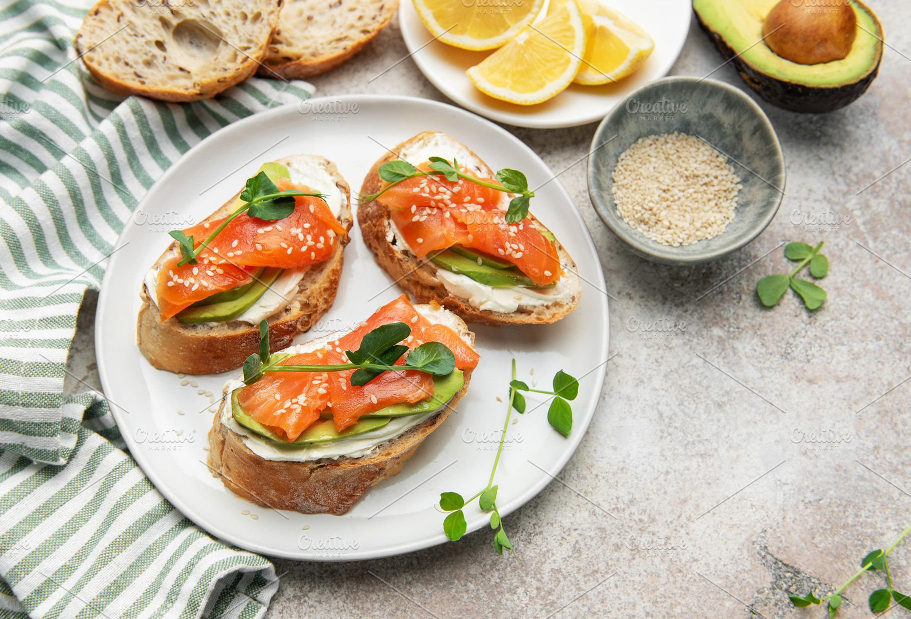 Bruschetta with salmon, avocado, and cream cheese, a Food & Drink Photo by Olena Rudo