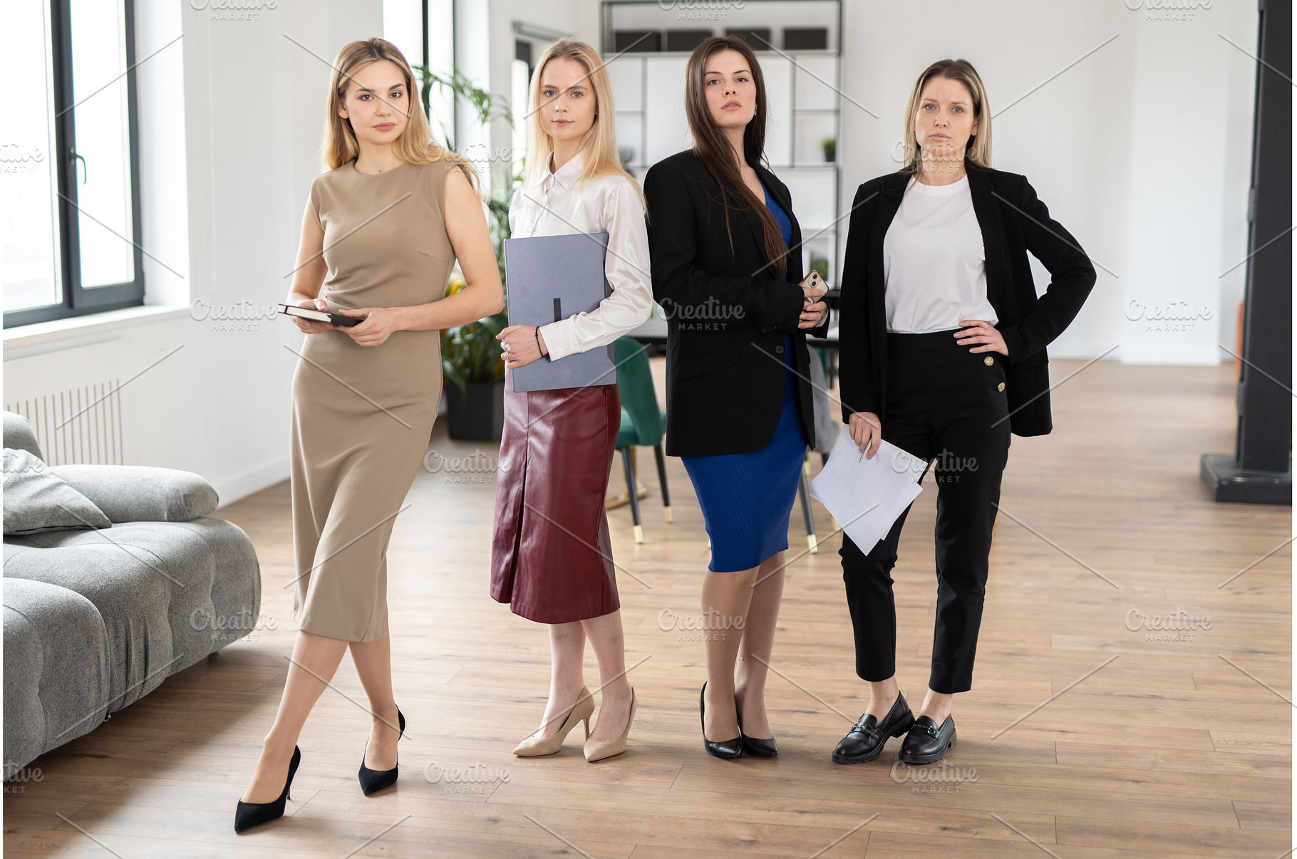 Four professional businesswomen, a Business Photo by undrey
