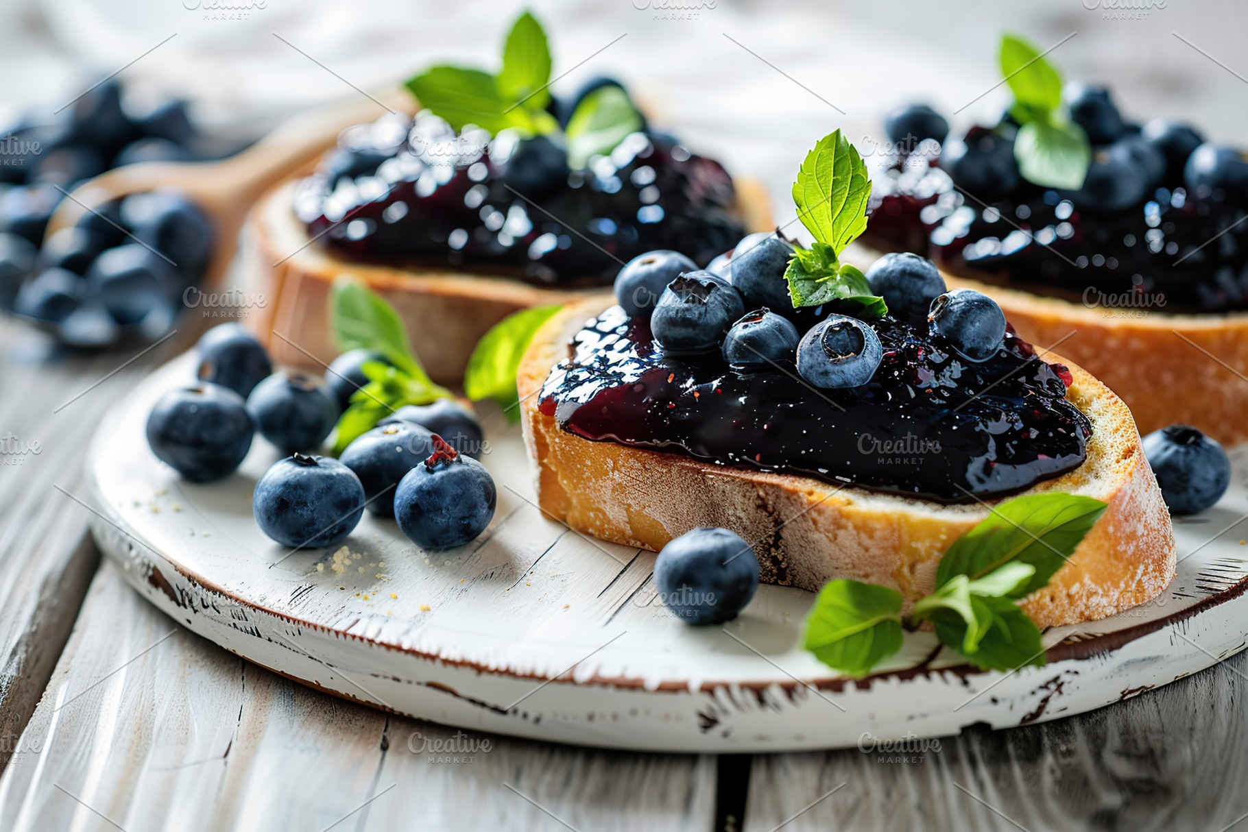 Toast breads with sweet blueberry jam on wooden table, a Food & Drink Photo by AlyaAnd