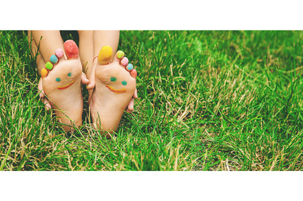 Children's feet with a pattern of, a Nature Photo by yanadjana