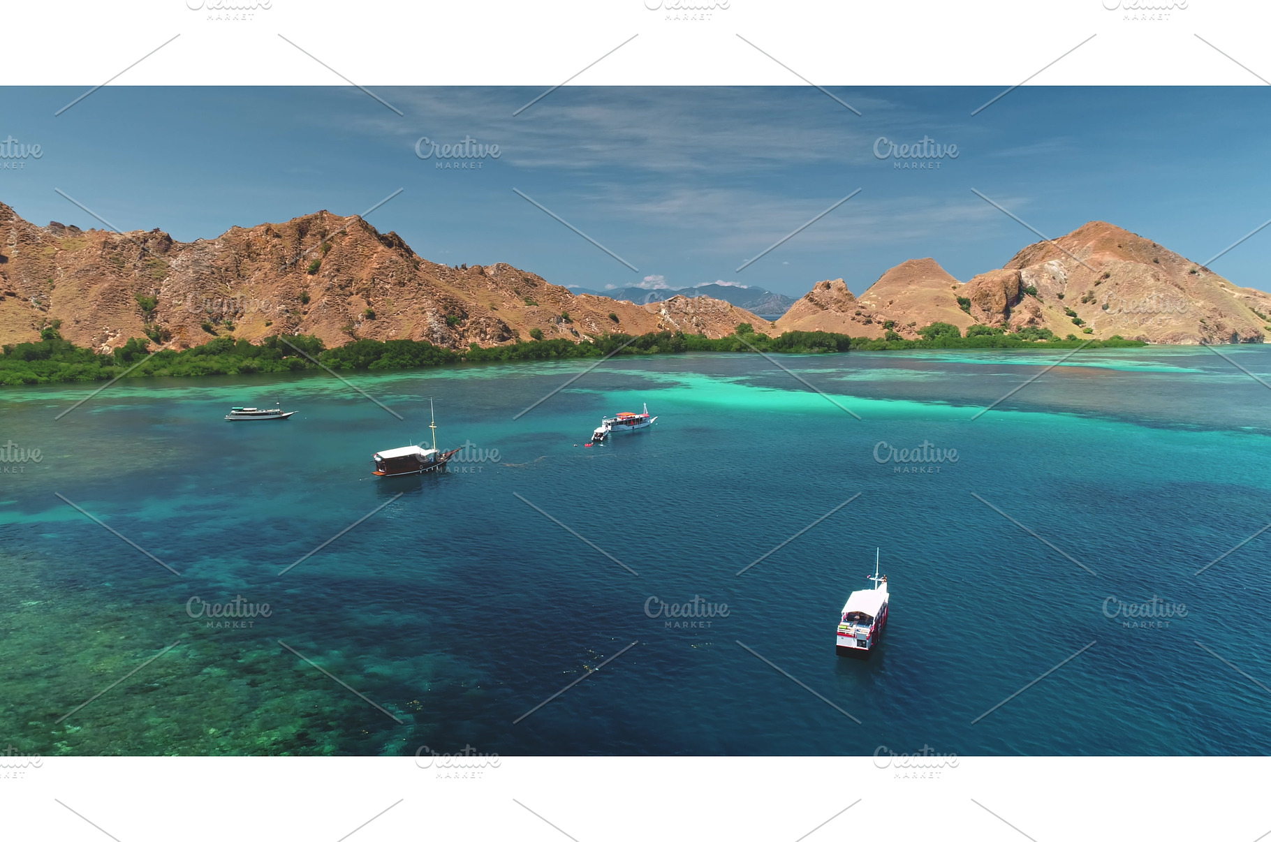 Tour boats sailing Komodo National, a Nature Photo by Goinyk