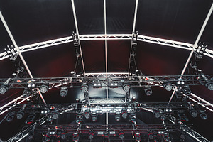 Concert stage lighting rig setup, a Technology Photo by SkyNext