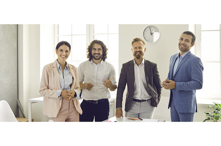 Portrait of four confident, friendly, a Person Photo by StudioRomantic