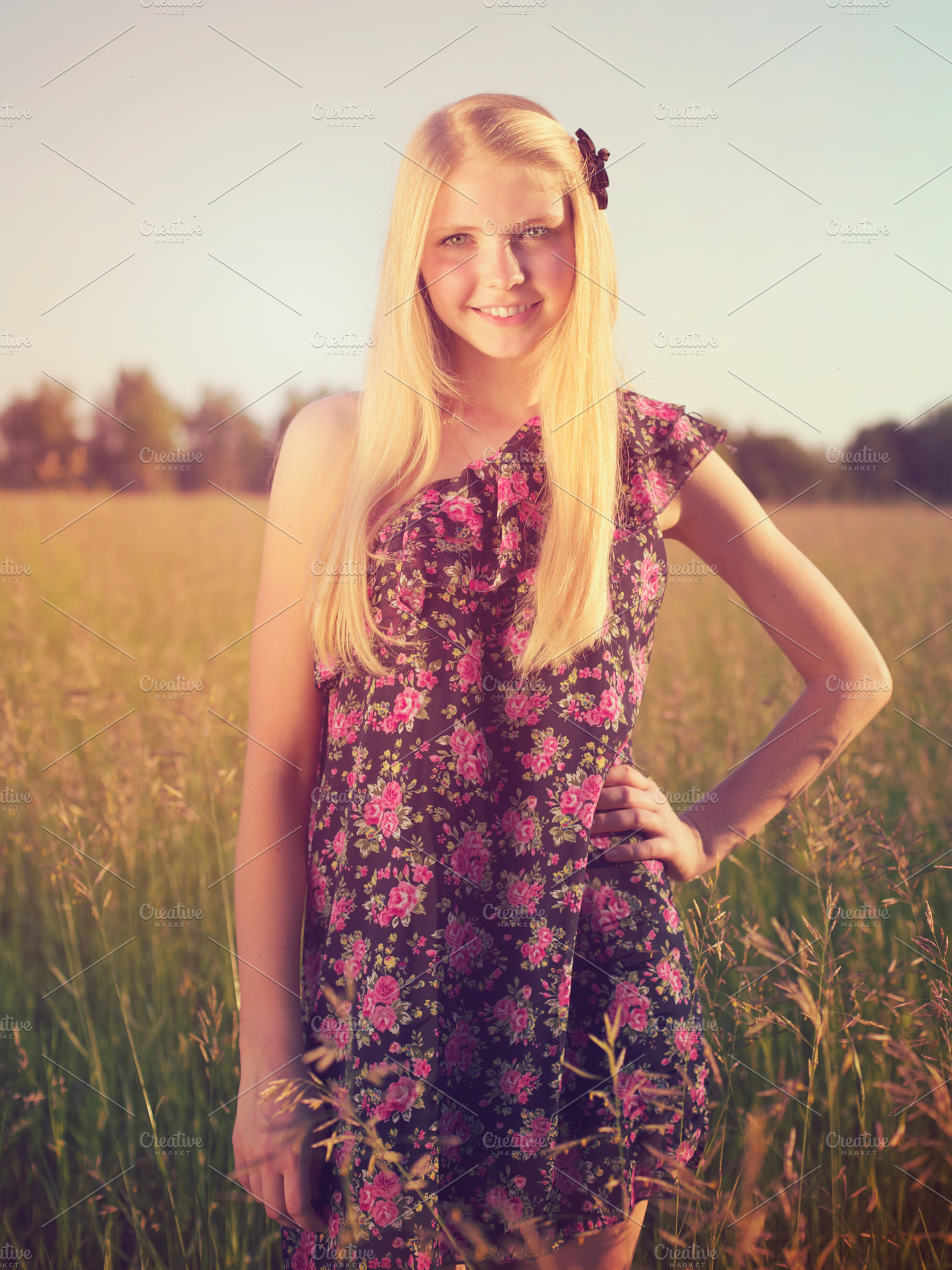 Young girl in summer field