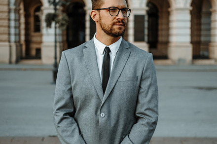 Businessman on street, a Person Photo by REDDOT Studio
