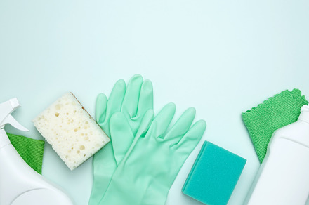 Concept of cleanliness and hygiene. Cleaning supplies and tools, including bott, a Photo by matucha