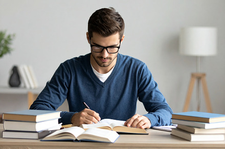 Student deeply concentrated on a book, surrounded by a calm and, a School & Education Photo by DanFLCreativo