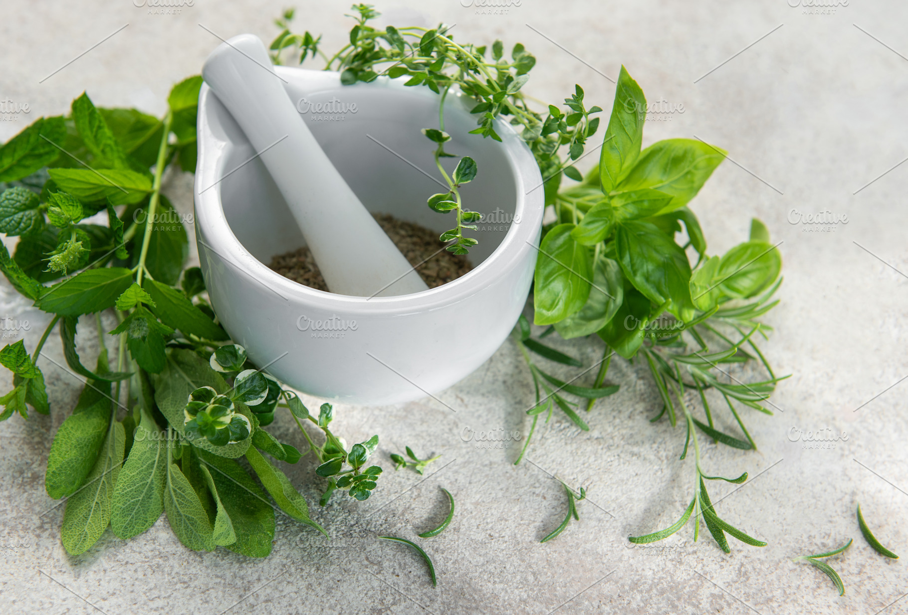 Mortar and pestle grinding fresh herbs for wellness, a Food & Drink Photo by Olena Rudo