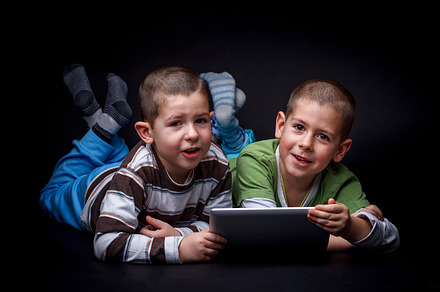 Children Using Electronic Tablet Featuring Black Background Boy And Brother preview 4