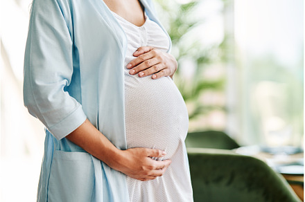 Closeup of pregnant woman holding, a Person Photo by Gladkov photography