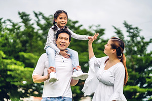 Portrait of enjoy happy love asian family father and mother hold