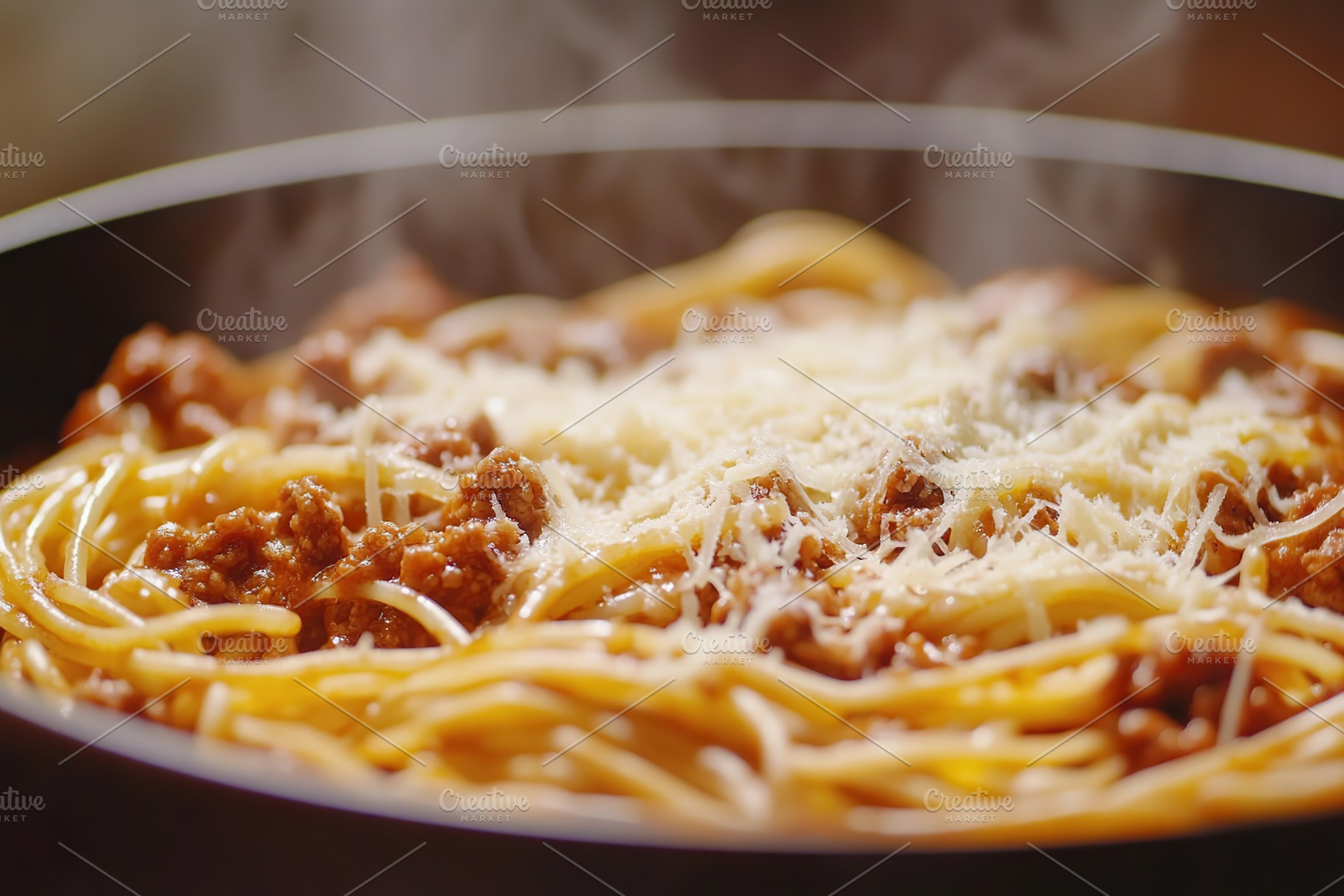 Spaghetti bolognese with ground beef on a frying pan, a Food & Drink Photo by AlyaAnd