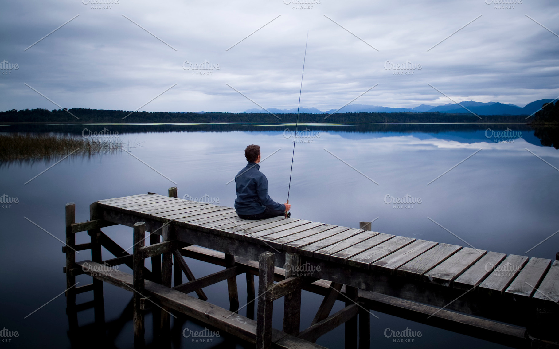 Fisherman On Jetty, a Person Photo by THP Creative