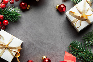 Christmas festive background with gifts, fir branches, and ornam, a Holiday Photo by Olena Rudo
