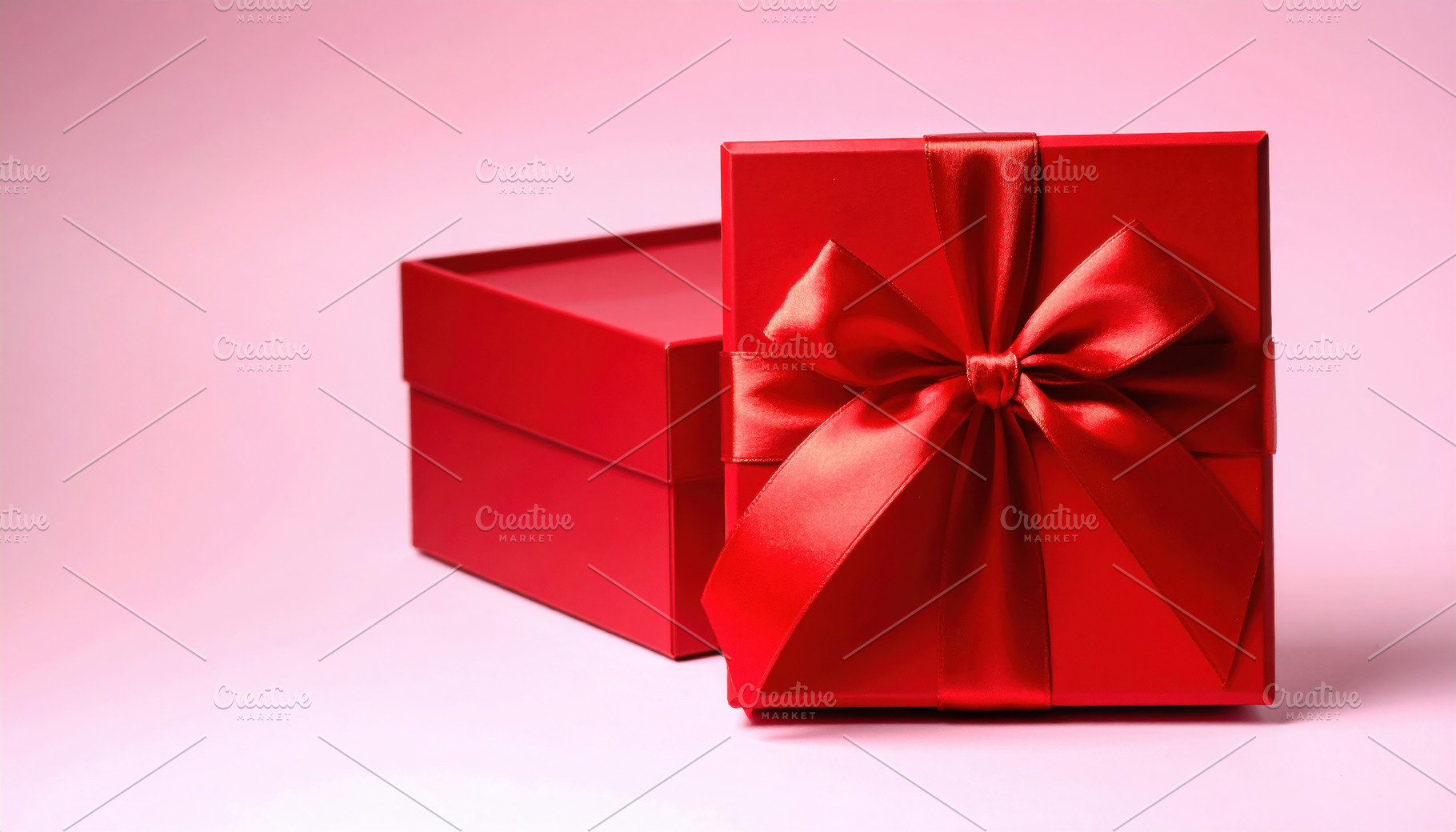 Open red gift box with satin ribbon, a Holiday Photo by Davizro's Market