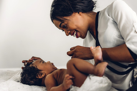 Portrait of enjoy happy love family african american mother play, a Person Photo by Art_Photo